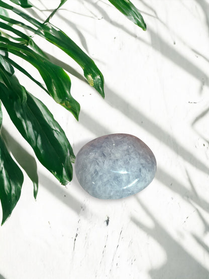 Blue chalcedony palm stone