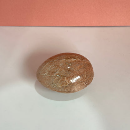 Peach moonstone palm stone